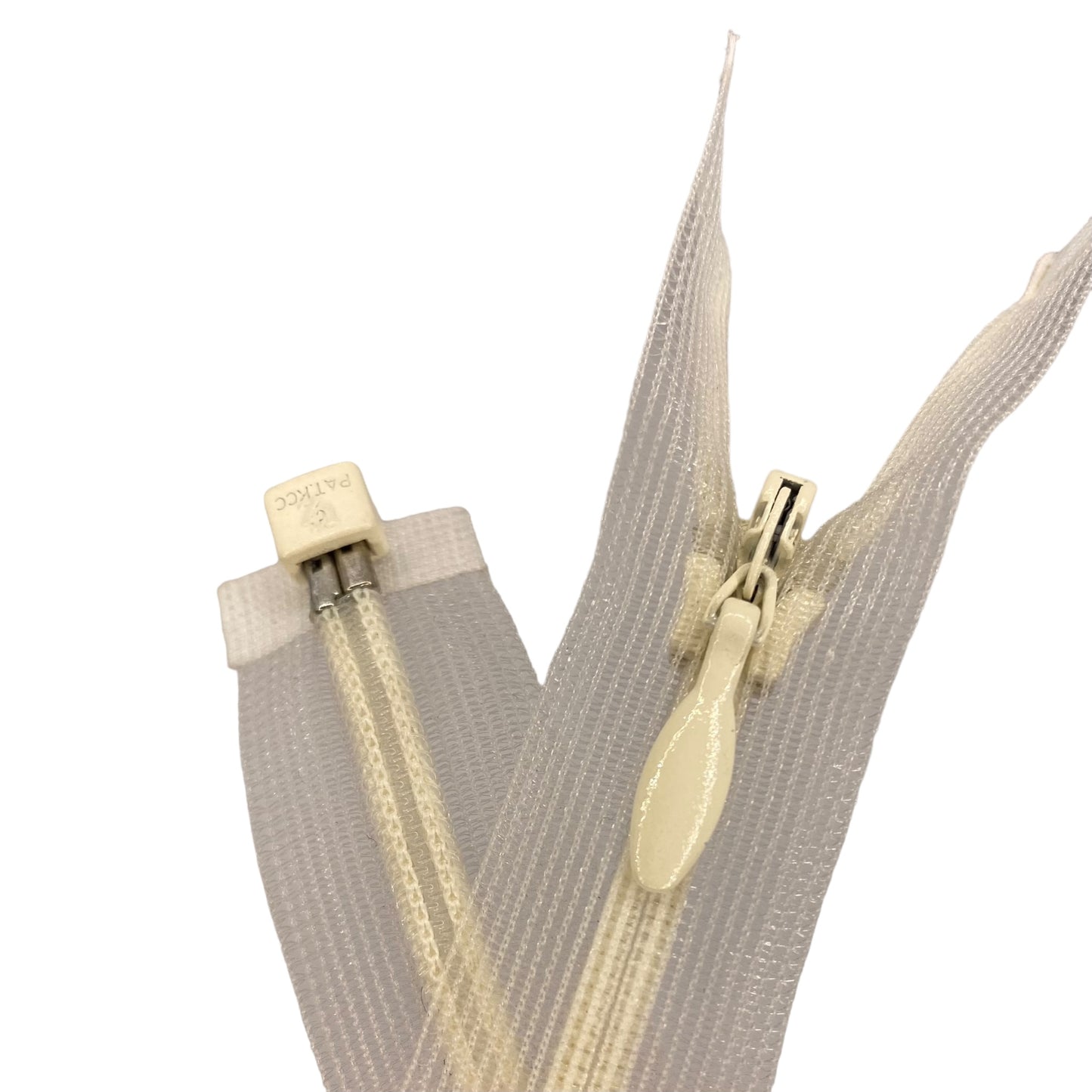 Nylon invisible zipper, transparent tape, open-end, ivory, 25 cm